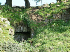 
A sluice in the back wall of the forge, Garnddyrys Forge, May 2012